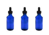 Blaue leere Flaschen des ätherischen Öls, die Parfüm-Chemie-Chemikalien speichern