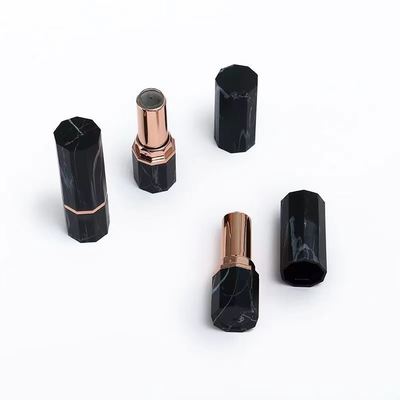 Luxus schwarzer Marmormuster achtseckiger Lippenstift-Rohrbehälter mit Roségold-Akzent