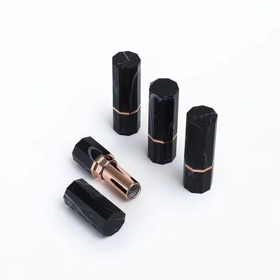 Luxus schwarzer Marmormuster achtseckiger Lippenstift-Rohrbehälter mit Roségold-Akzent