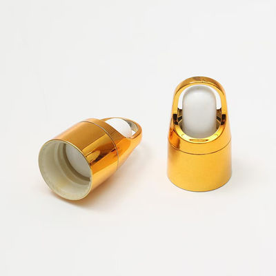Durchsichtige Glasflasche mit Goldkappe